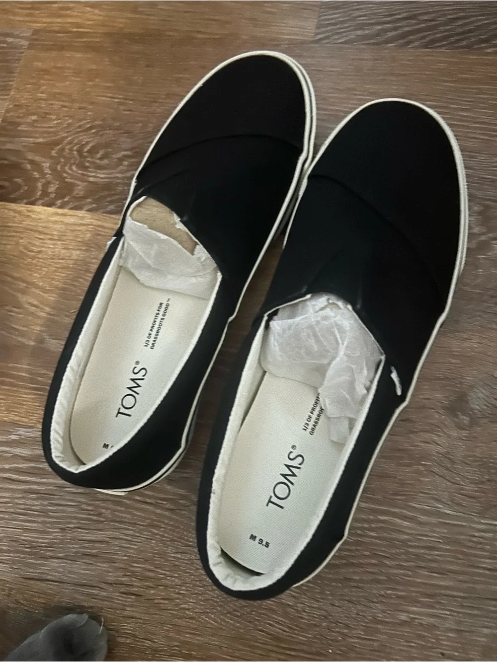 TOMS Black Canvas Slip-On Sneakers with White Trim